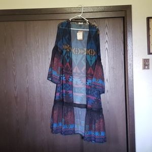 Tasha Polizzi duster